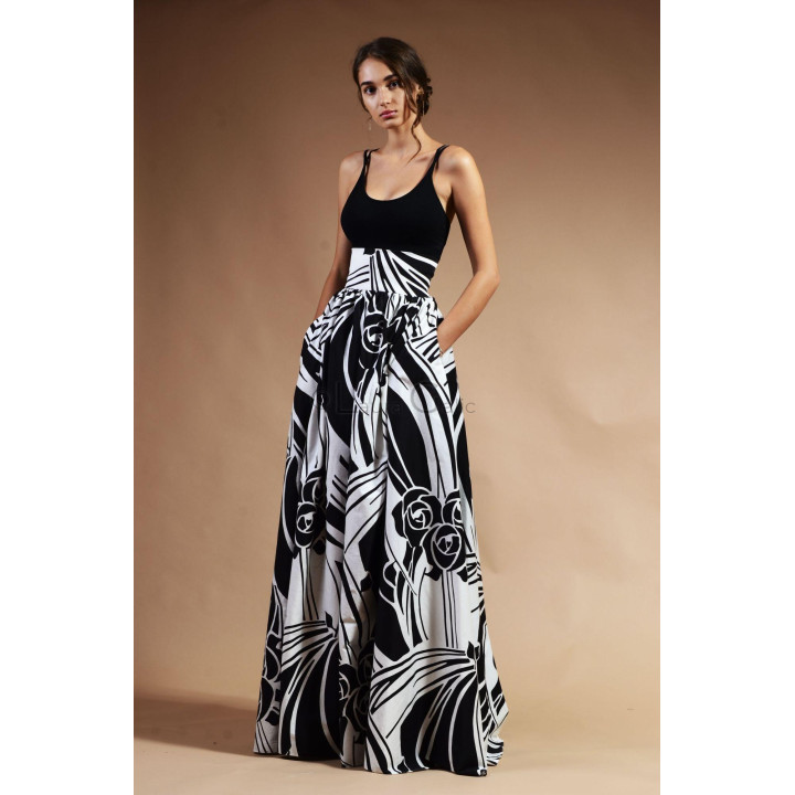 Full-length black-and-white maxi skirt with a wide waistband and stylised floral print