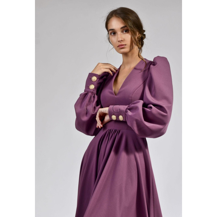Close detail of the Antonia 1 puff sleeve and gold-tone cuff buttons