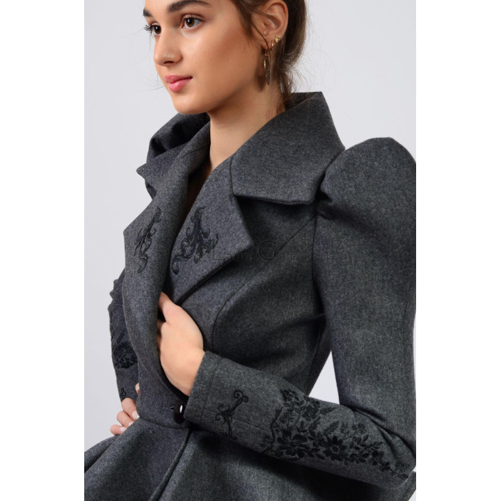 Close-up of the embroidered lapel and cuff on the grey Carmen 6 jacket
