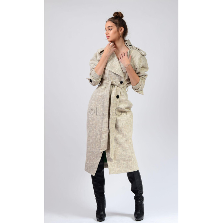 Tudora coat fastened with a belt, showing overlapping lapels and voluminous sleeves