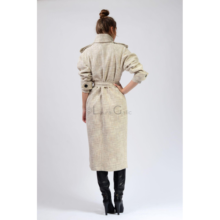 Back view of the beige Tudora coat with a waist belt and raised collar