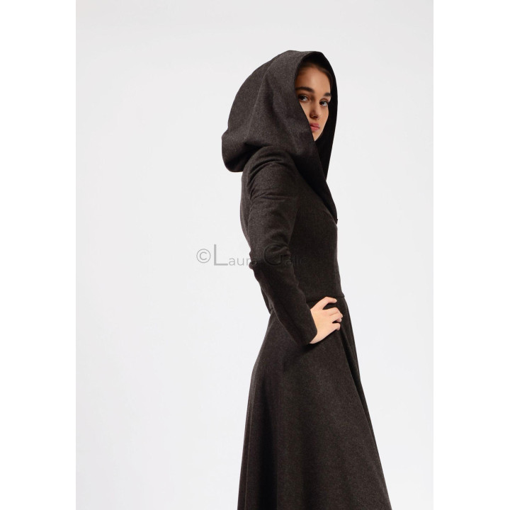 Side view of the Miranda 2 coat showing its generous hood and fitted waist