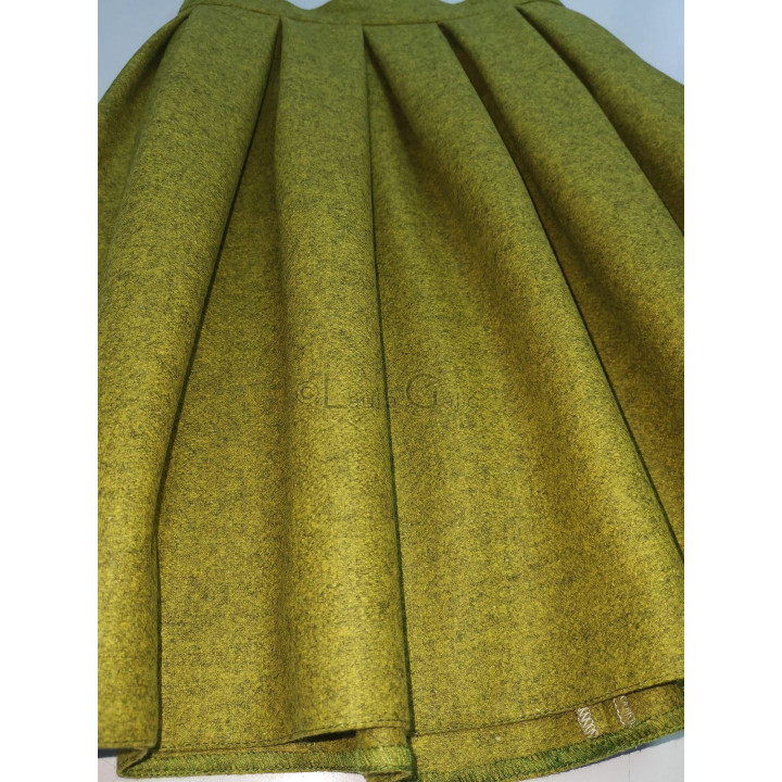 Close-up of the pleats and texture on the olive green Gina skirt