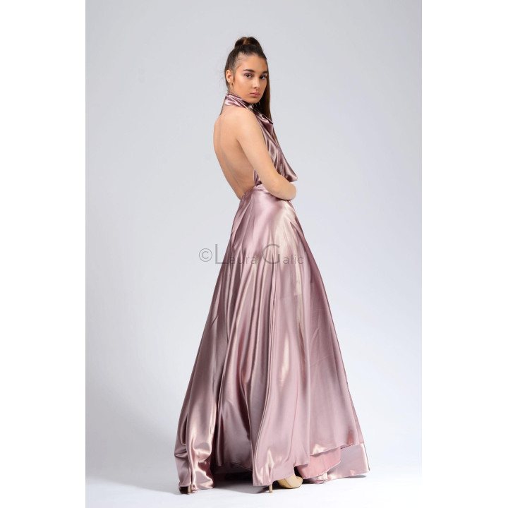 Back view of the Agnes 1 dress, showing its open back and flowing skirt