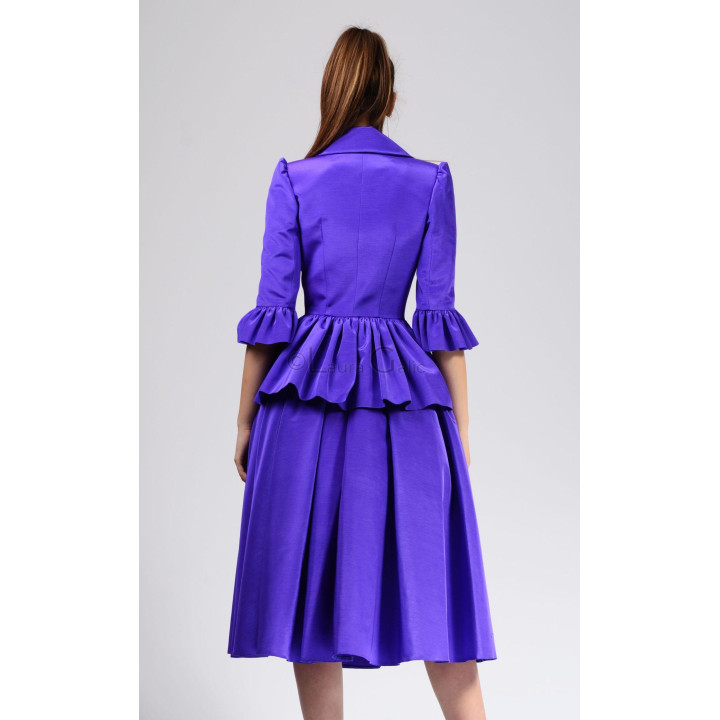Back view of the Elara jacket with three-quarter sleeves and flounced peplum