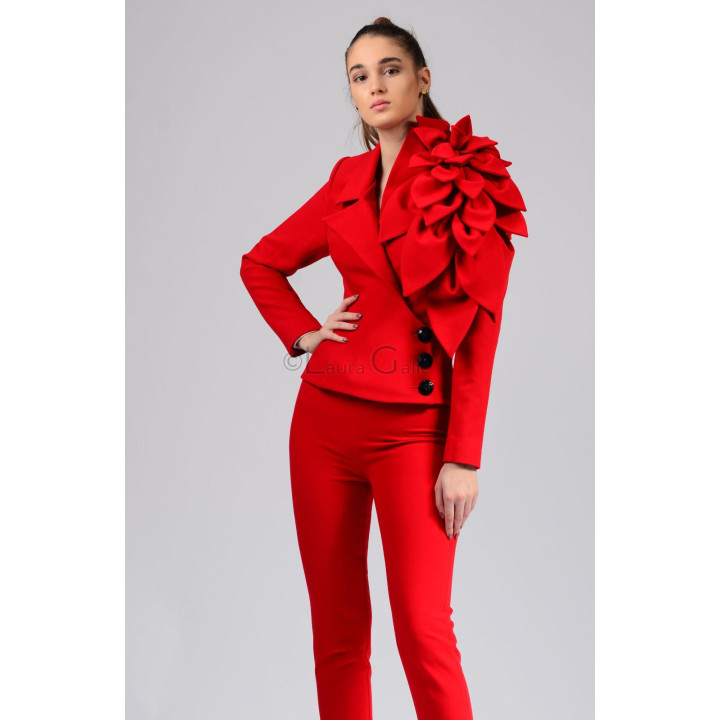 Red Delia jacket with an oversized shoulder flower and black buttons
