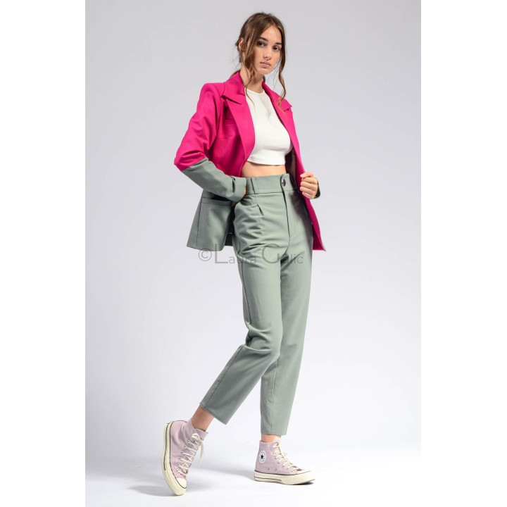 Ramona two-tone suit with the jacket open and high-waisted trousers
