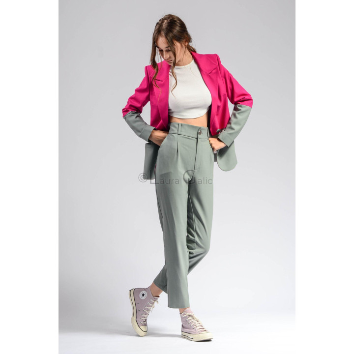 Ramona jacket detail showing contrasting magenta and sage-grey sleeves and panels