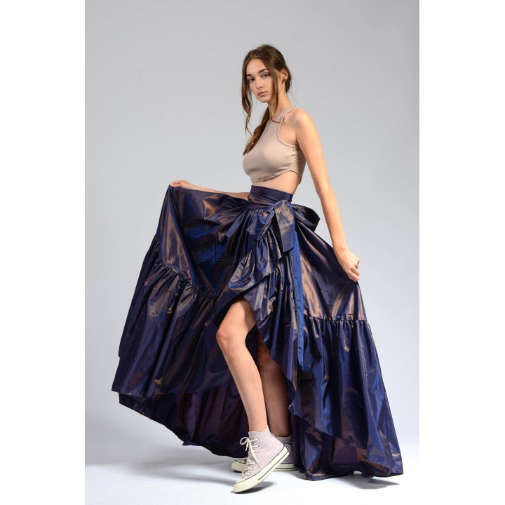 Close view of the Anabel skirt's overlapping wrap panel and cascading ruffles
