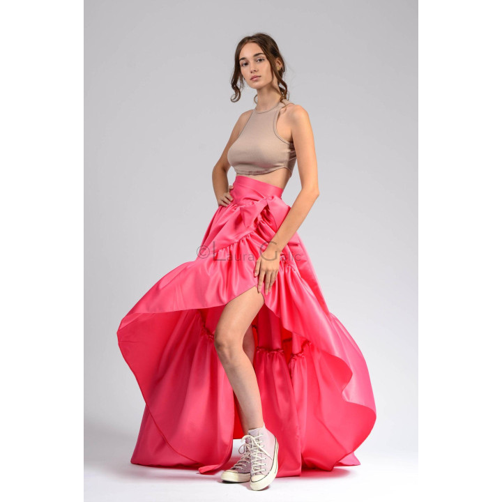 Anabel wrap skirt with an asymmetric front opening and layered pink ruffles