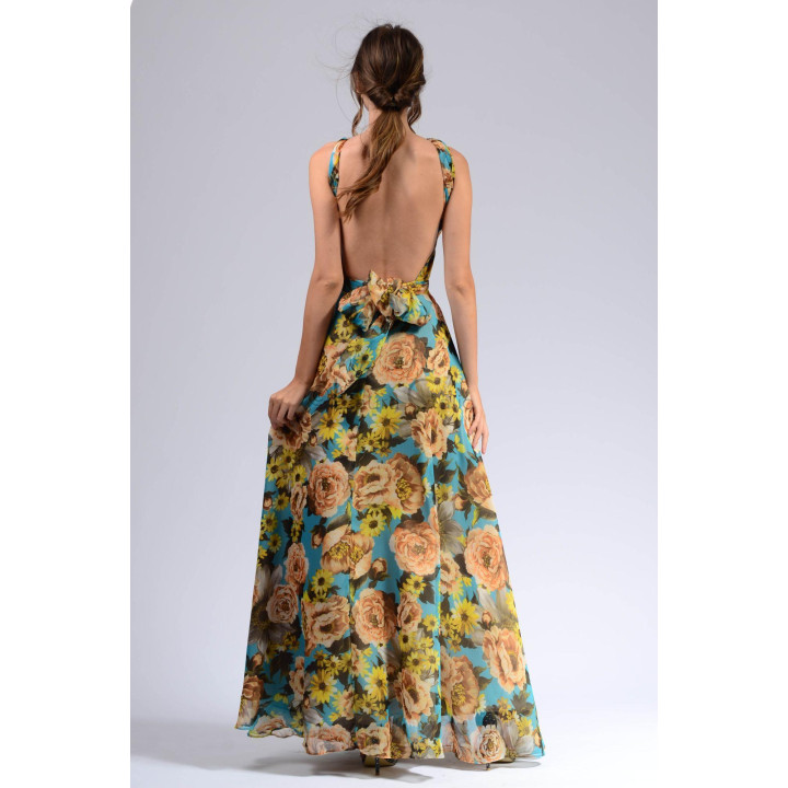 Back view of the Agnes 2 dress showing its open back and waist tie