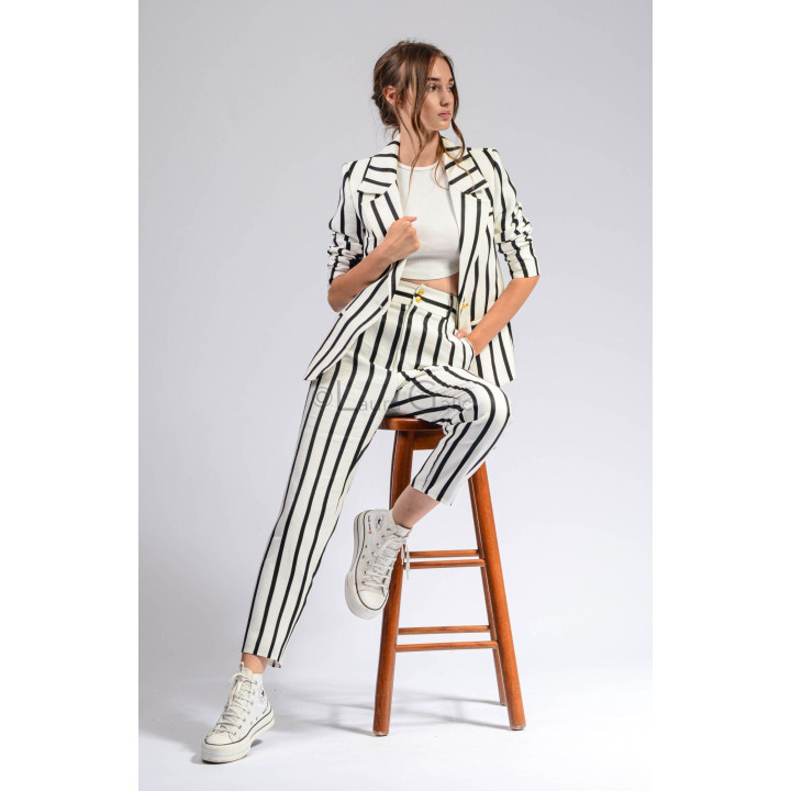 Ramona striped women’s suit with a lapel jacket and trousers, styled with a white top