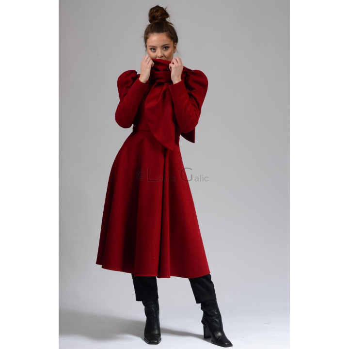 Beatrice 3 coat showing its flared skirt and scarf-like front collar panel