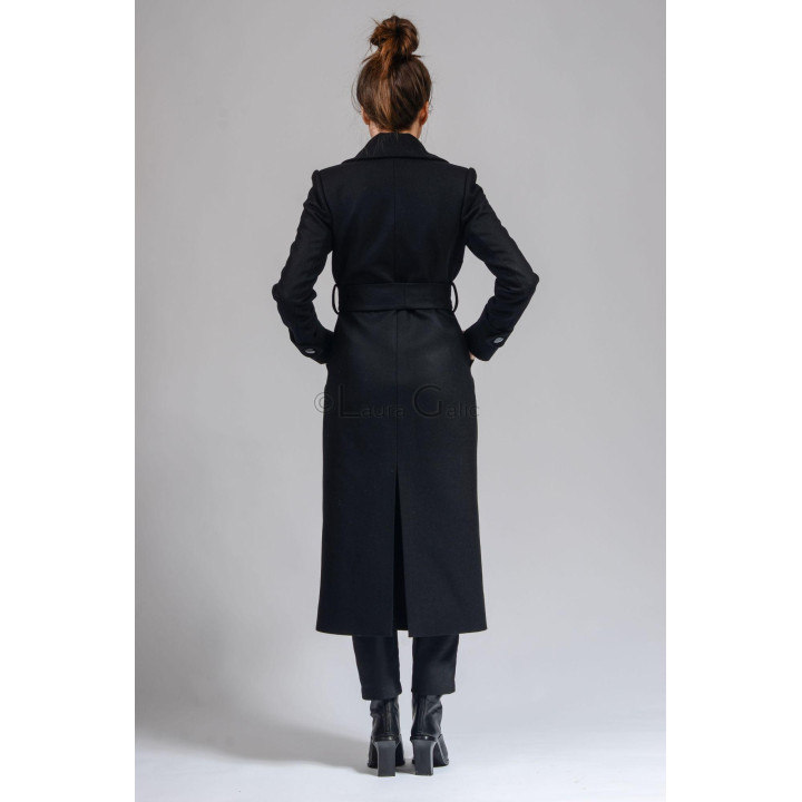 Back view of the Romanita 3 coat with a belt and hem vent