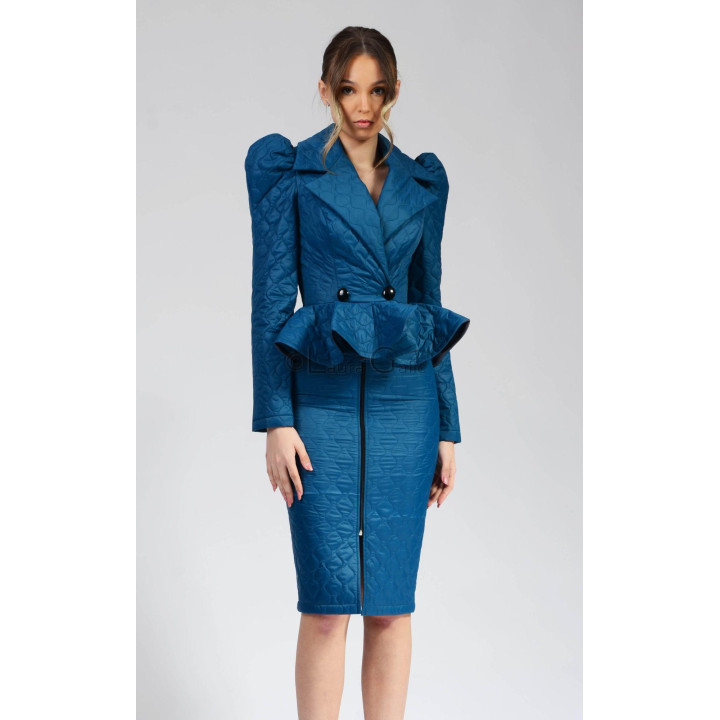 Front view of the Carmen 2 turquoise suit with wide lapels and pronounced shoulders