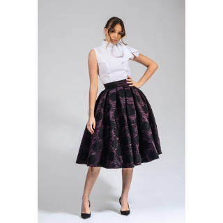 Marisa pleated taffeta skirt in plum purple with black circles, styled with a white blouse