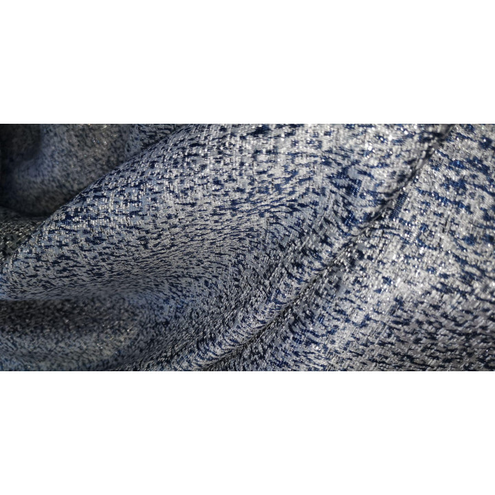 Close-up of lustrous woven brocade fabric in a blue and silver colourway