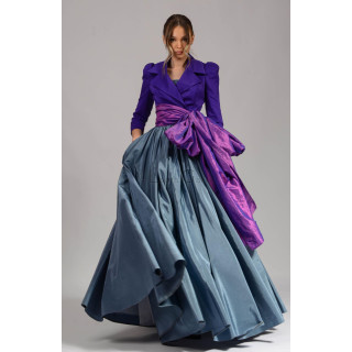 Suzana 1 ensemble with purple jacket, full blue skirt and purple wrap tied at the waist