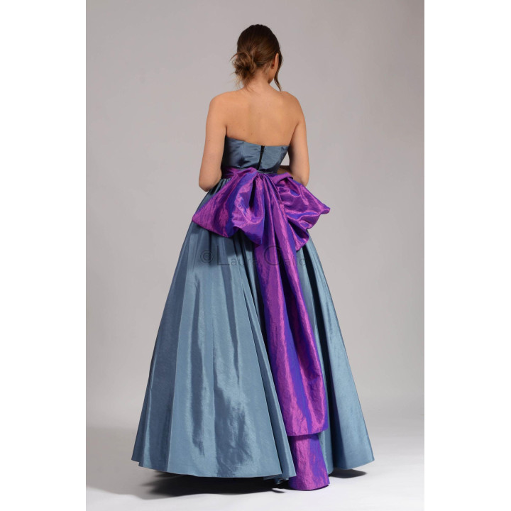 Back view of the Suzana 1 ensemble showing the blue corset zipper and detachable purple wrap
