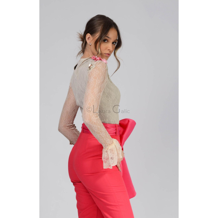 Side view of the Carmina 1 blouse with lace sleeves and a flared cuff