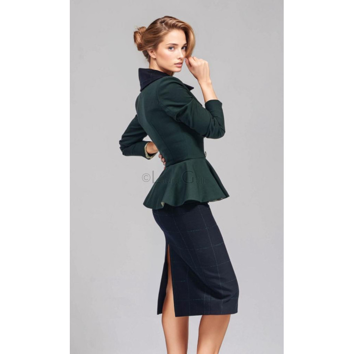 Back view of the Lupe suit showing the peplum jacket and slit pencil skirt