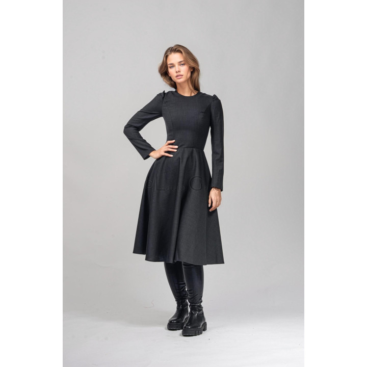 Fitted waist and A-line skirt detail on the Pita 4 dress