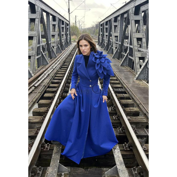 Delia long coat with a defined waist, voluminous skirt and oversized flower