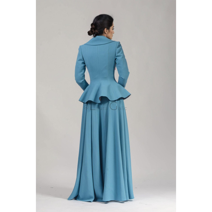 Back view of the blue Inez 3 suit with peplum jacket and Cezara long skirt