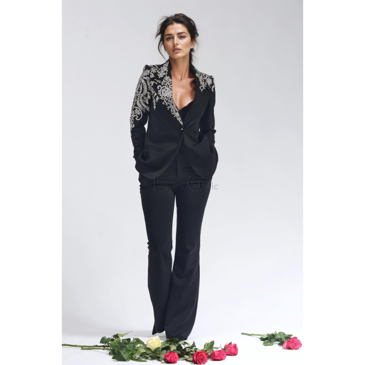 Full-length Freida two-piece suit with an embellished jacket and black flared trousers