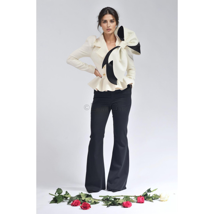 Four-piece Carmen suit with ivory jacket, cape, detachable bow and black flared trousers