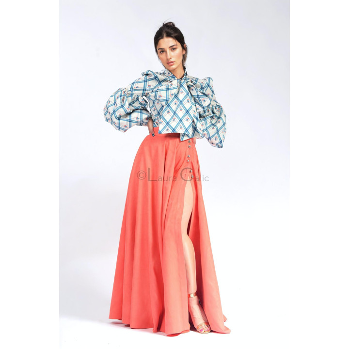 Luana shirt styled with a bow at the neck and long, voluminous sleeves