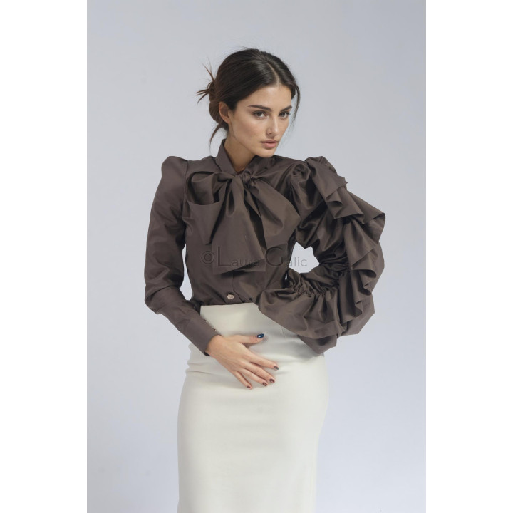 Iunia taupe office shirt with a statement neck scarf and oversized ruffled sleeve