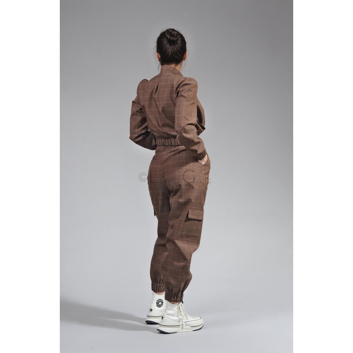 Back view of the Smart-Cargo suit, showing the elasticated jacket hem and checked cargo trousers