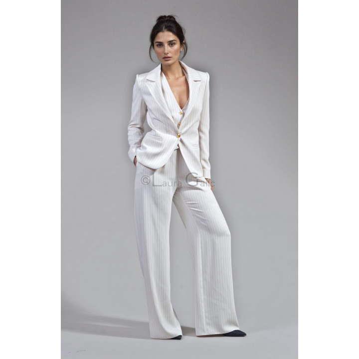 Ramona pinstripe blazer worn over the deep V-neck waistcoat