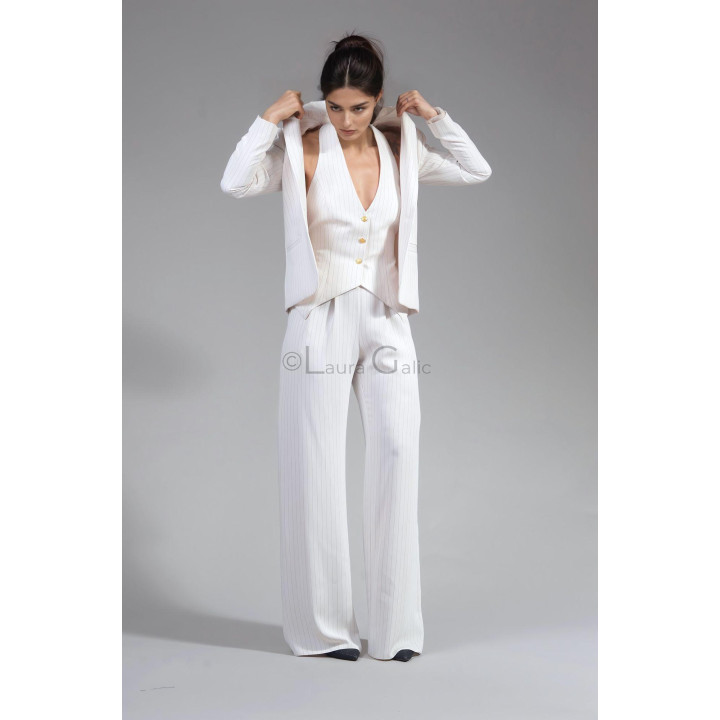 Ramona waistcoat with deep neckline and gold-tone buttons beneath the blazer
