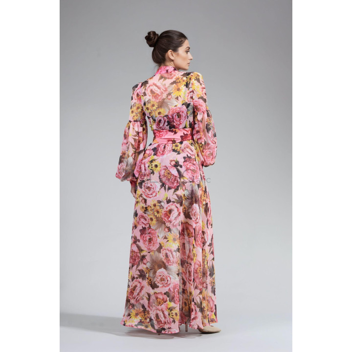 Back view of the Luana maxi dress showing its full-length floral skirt