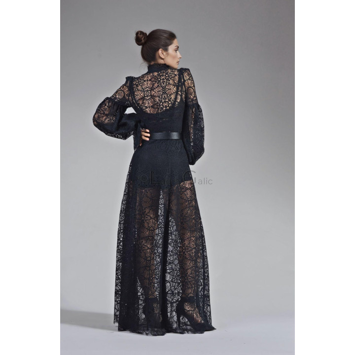 Back view of the Luana dress in black lace with the waist defined by a belt