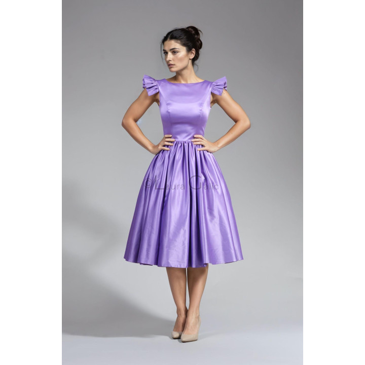 Close view of the Lidia dress bodice and ruffled shoulder straps