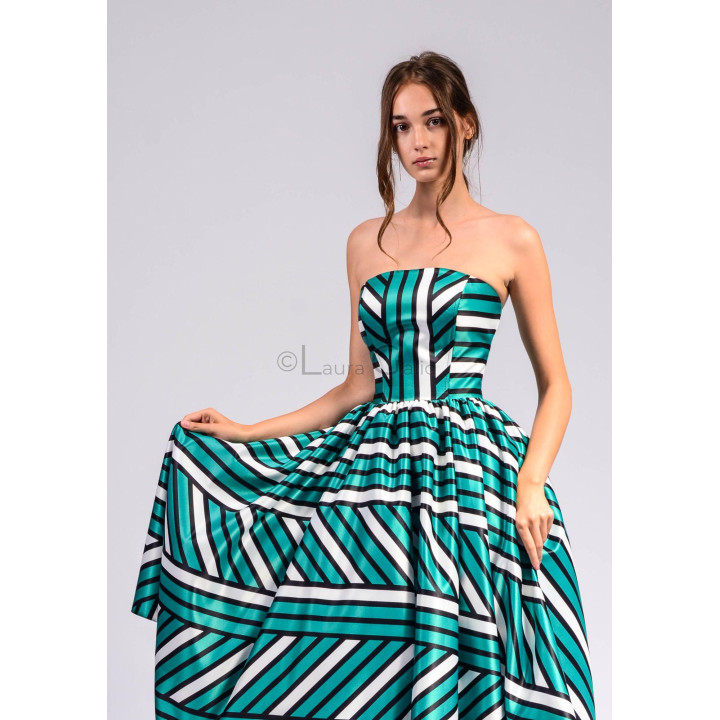 Loredana 1 dress with the full skirt spread out to show its geometric print