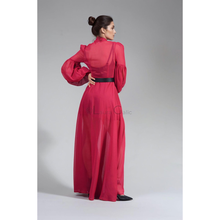 Vedere din spate a rochiei maxi Luana fucsia din voal texturat, cu mâneci lungi și fustă fluidă