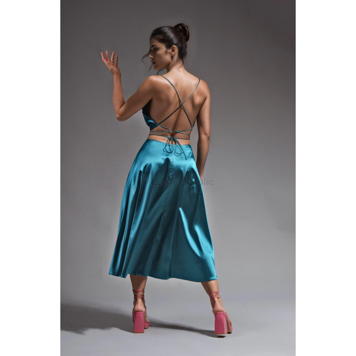 Back view of the Citra dress with an open back and crossed tie straps