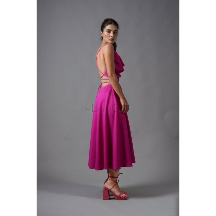 Citra fuchsia midi dress in profile, showing the open back, waist ties and semi-circle skirt