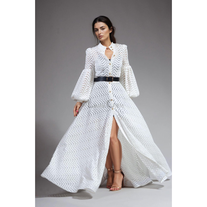 Luana white lace dress with a zigzag pattern and full skirt shown in motion