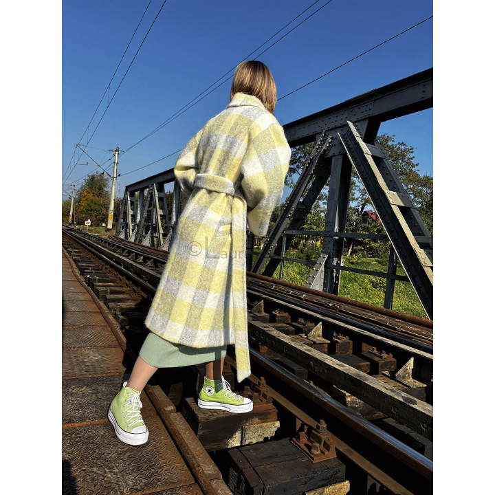 Back view of the Laura 2 wool coat with a belted waist and plaid pattern