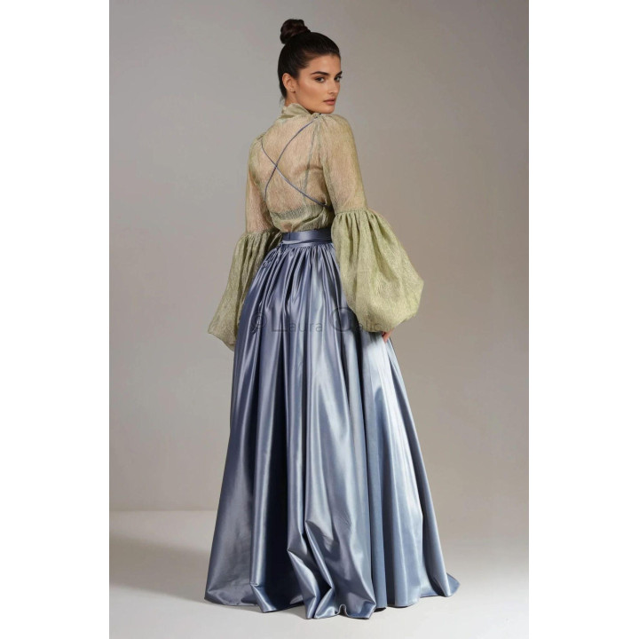 Back view of the painted ensemble showing the blouse, defined waist and full skirt