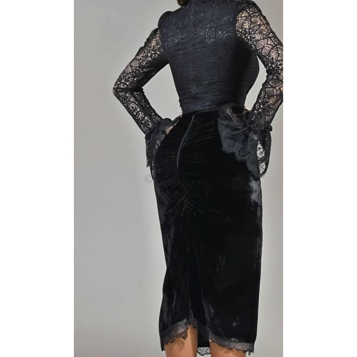 Detail of the black Pandora silk velvet midi skirt with front gathering and lace-trimmed hem
