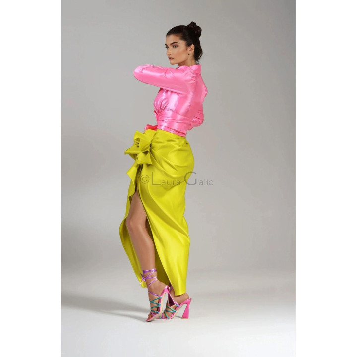 Long yellow-green Oraya skirt with a dramatic side ruffle and front opening