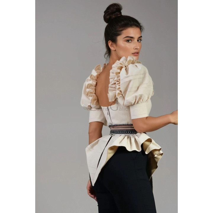 Back detail of the Mălina shirt showing its zipper and pleated apron