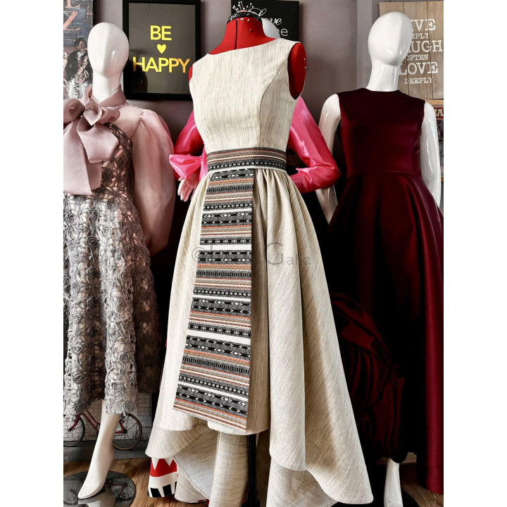 Lidia 3 midi dress showing its asymmetrical neckline and geometric apron