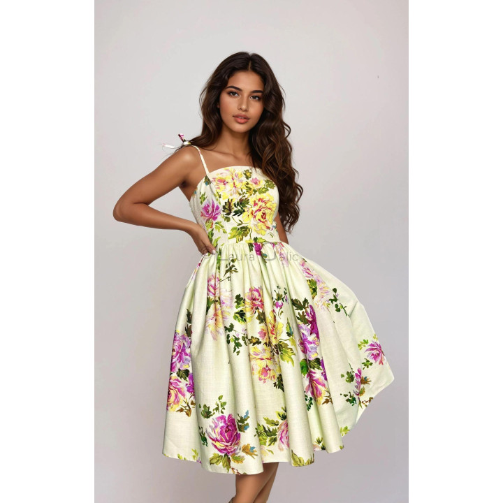Dalma linen dress with its full floral-print skirt spread out
